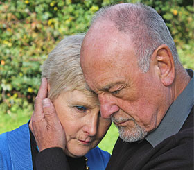 grieving couple