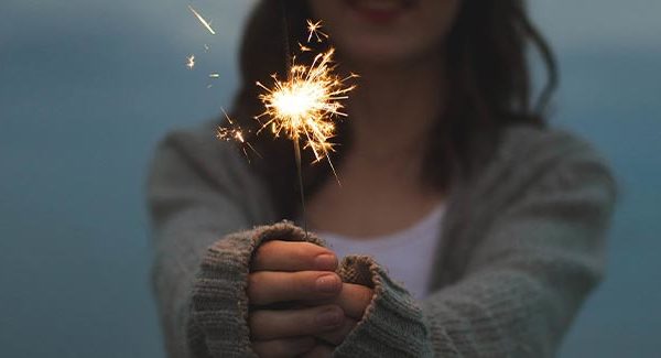 Girl holding a sparkler Fares J Radel blog image