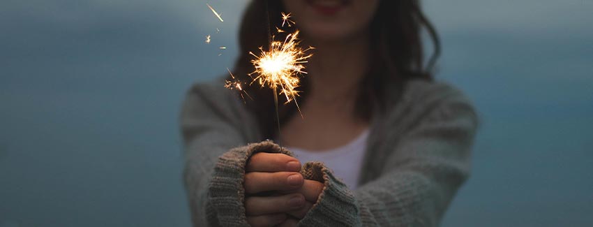 Girl holding a sparkler Fares J Radel blog image