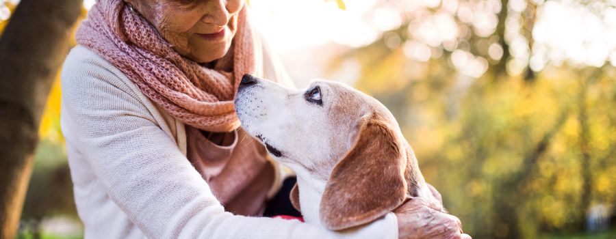 old woman with old dog